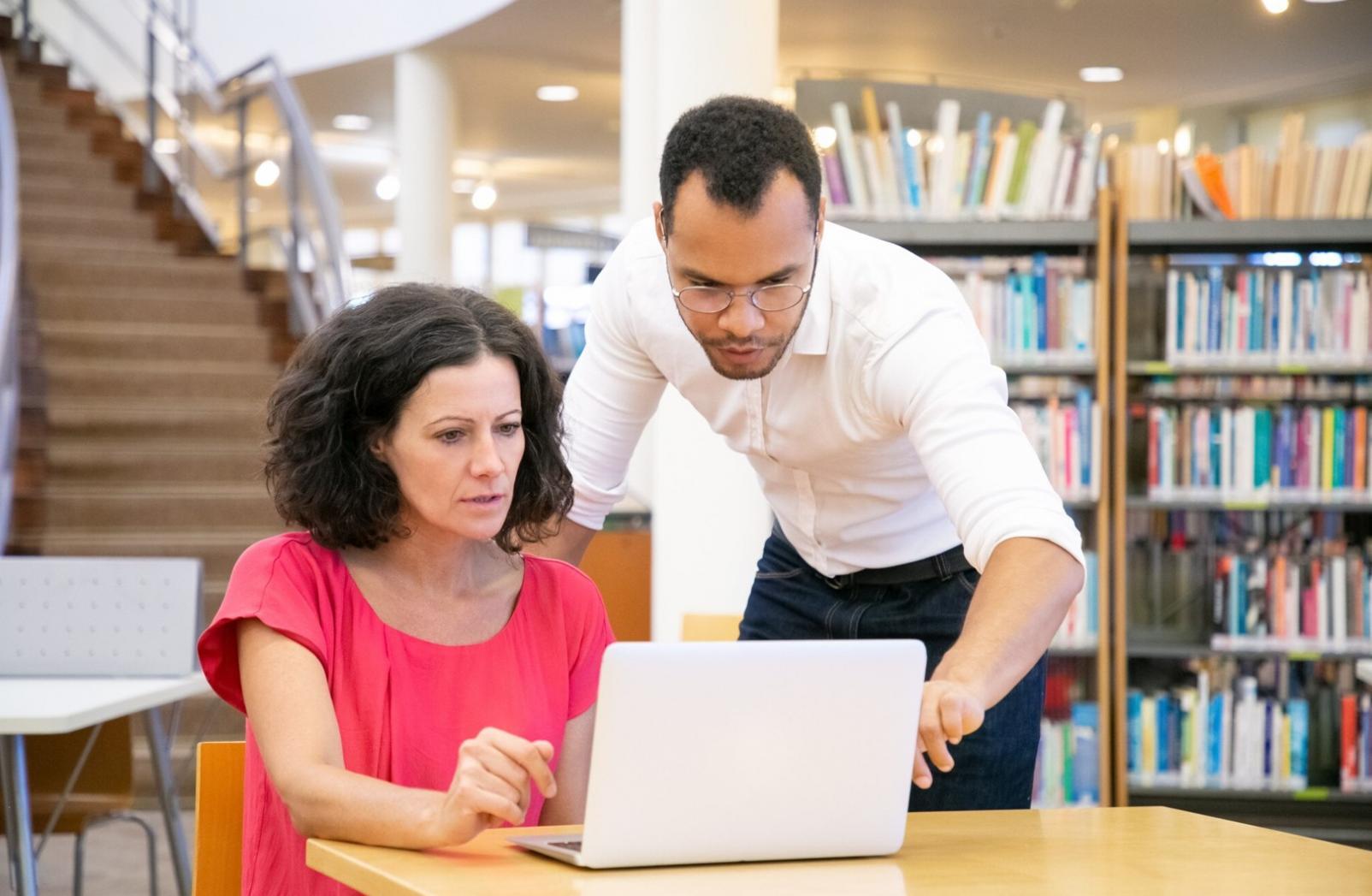 Team coordination meeting with testing professionals discussing project workflows